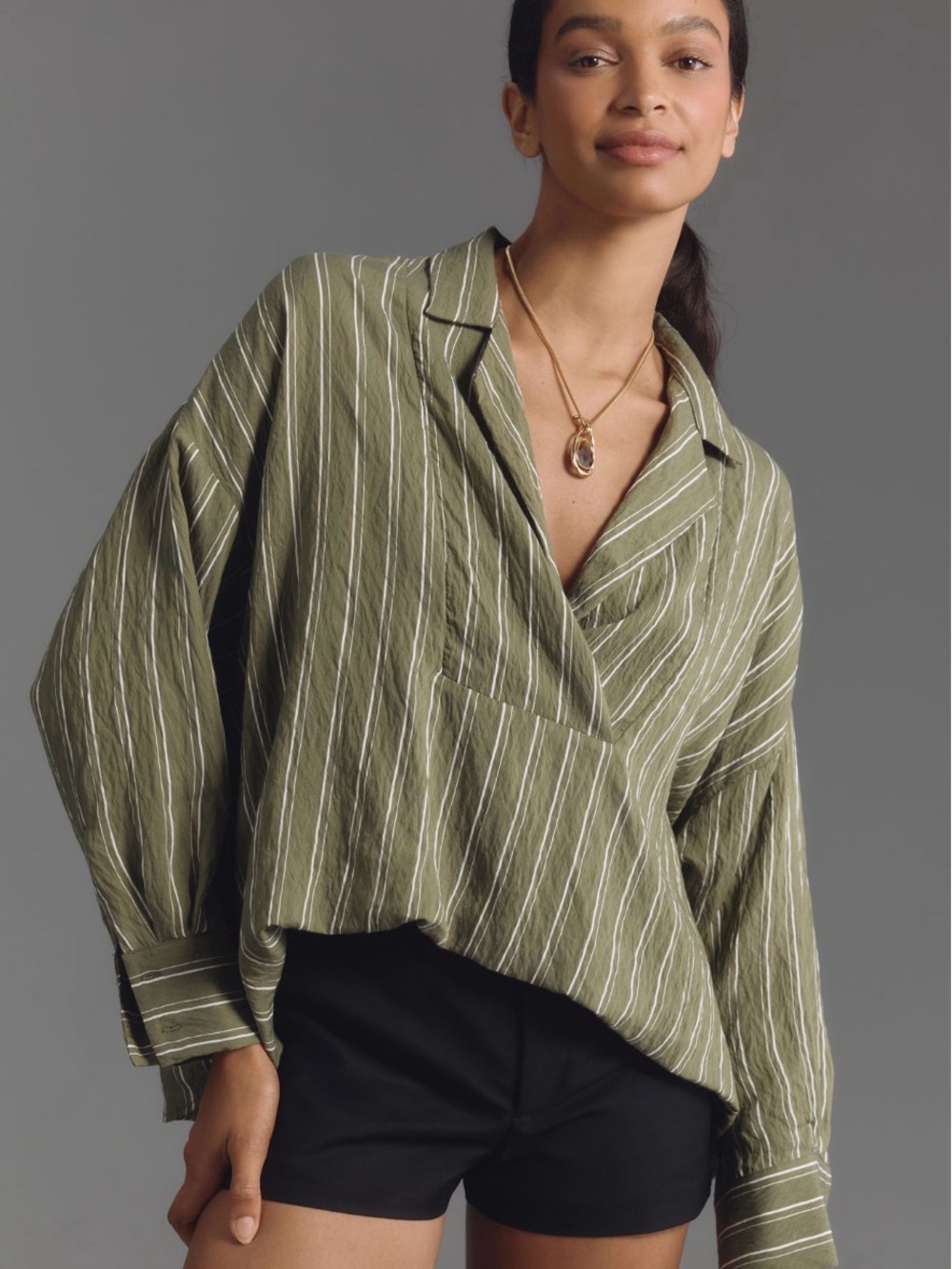 The Dylon long sleeve wide placket top Women’s Top 27” long by Anthropologie